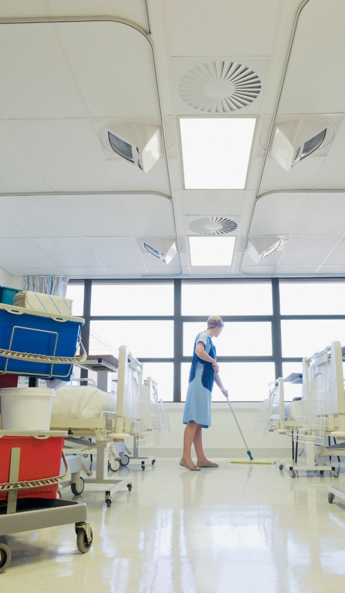 How do janitorial roles differ from custodial roles?